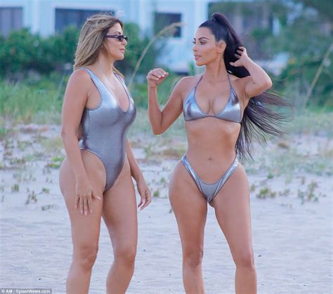 Kim Kardashian Displays Her Hot Sexy Body In A Silver Coloured Bikini