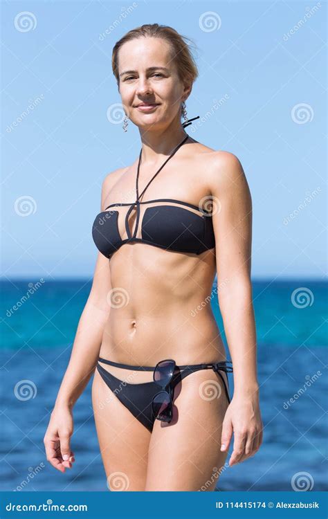 Portrait Of Short Haired Tanned Girl In Bikini Against Sea My Xxx Hot