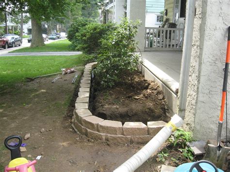 If possible, plan the length of your wall so it's divisible by 16 inches (the length of the rebar extends into the cores when you set the blocks. Interlocking Block Garden Wall - Landscaping & Lawn Care ...
