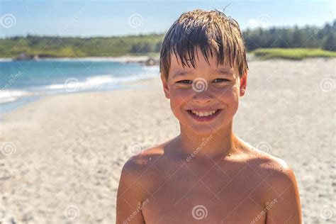 A Happy Smiling Young Boy At The Beach Stock Image Image Of Body