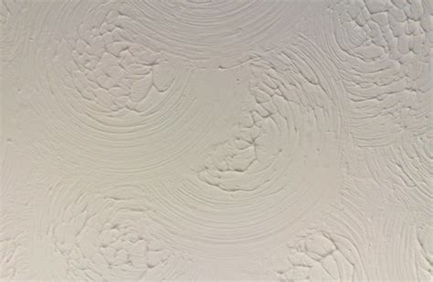 A roller with a pattern cut out creates a repeating motif. Learn About the Different Types of Ceiling Textures and ...