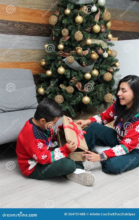 Divorced Single Mom And Son Latino Have Christmas Presents Sitting By
