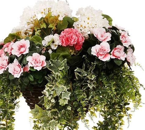 A Very Pink Flowery Artificial Hanging Basket With Lush Green Foliage