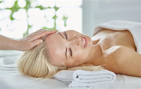 Beautiful Woman With Closed Eyes Getting A Massage In The Spa S Stock Image Image Of Lying