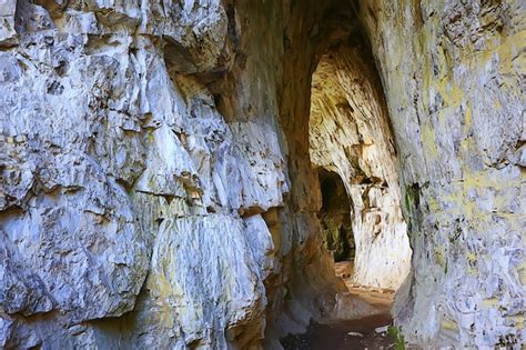 Premium Photo Cave In The Mountains Stone Tunnel Natural Landscape