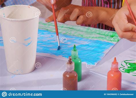 Close Up Group Of Children Painting Pictures Talent Creativity