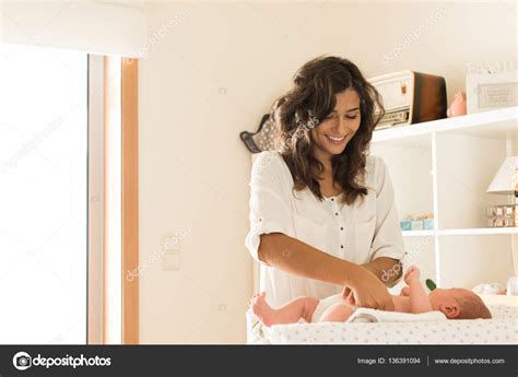 Mother Changing Babys Diaper — Stock Photo © Jolopes 136391094