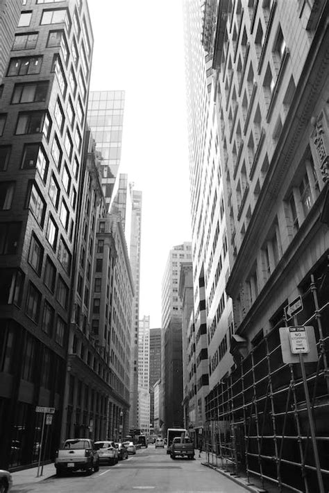 Grayscale Photo Of High Rise Buildings · Free Stock Photo