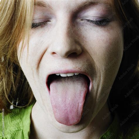 Woman Sticking Out Her Tongue Stock Photo Adobe Stock