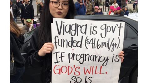 woman s protest sign brilliantly points out the hypocrisy in arguing against federal funding for