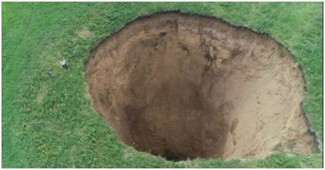 Russian Villagers Alarmed To Find Foot Wide Sinkhole Near Their Homes Overnight MEAWW