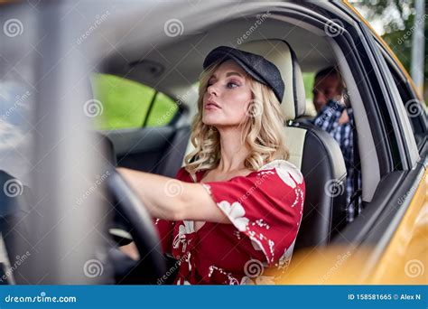 Image Of Blonde Female Driver Driving Male Passenger In Car Stock Image Image Of Road Long