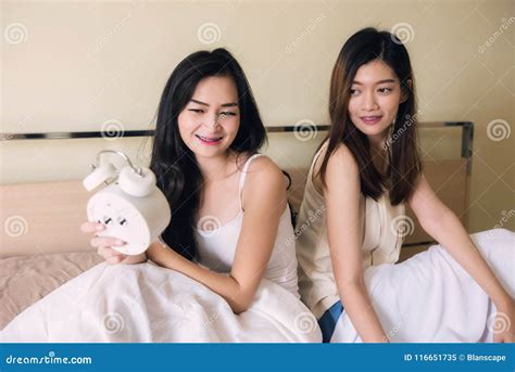 Asian Female Lesbian Look At Alarm Clock Stock Image Image Of Lazy