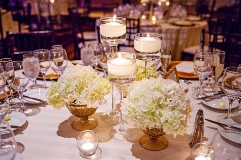 white hydrangea and floating candle centerpieces