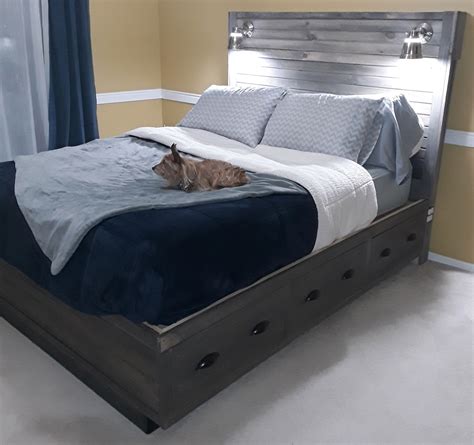 A headboard created with storage cubbies makes a place for books, clocks, and the rest of your sleep routine essentials. Ana White | Queen size storage bed with headboard storage ...