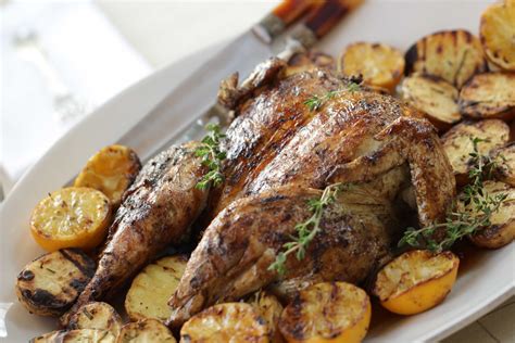 Transfer chicken and potatoes to heated platter. Grilled Lemon Thyme Chicken with Rosemary Potatoes ...