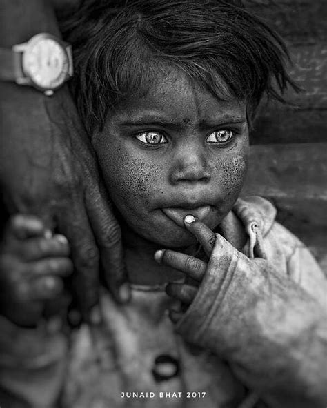 Poverty Portrait Of A Poor Little Indian Girl Photo