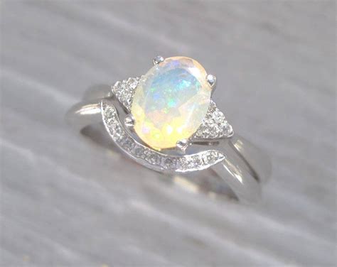 Knowing how to care for opal jewelry, especially opal wedding rings, is important before purchasing. Bridel Set Opal Engagement Ring, Antique Engagement Opal ...