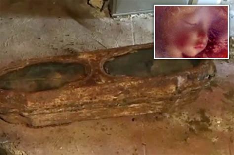 Disturbing Vid Shows Preserved Child Found In Glass Coffin Under House
