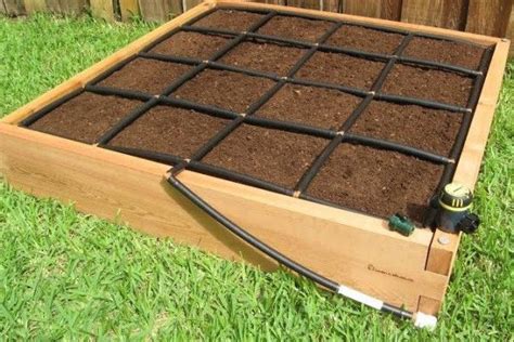 Drip Watering System That Also Defines The Square Foot Gardening