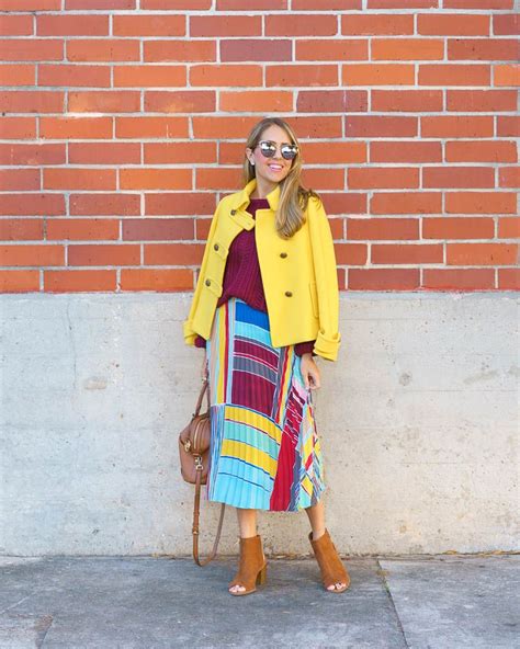 Colorful Winter Outfit Yellow Coat Pleated Skirt Holiday Outfits
