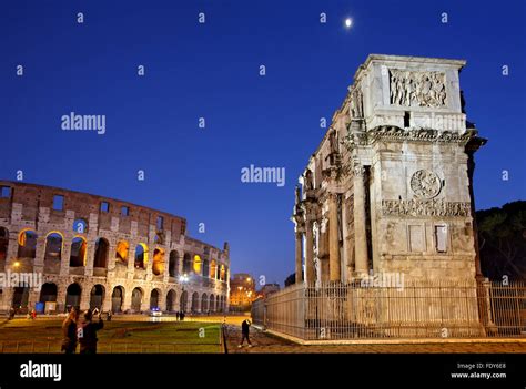 The Arch Of Constantine And The Colosseum Flavian Amphitheater In