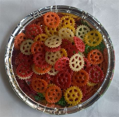 Colorful Wheel Shaped Fryums Packaging Type Loose At Rs 49kg In Navsari