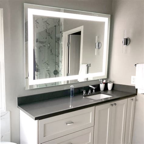 Brighten up your bathroom with a lighted bath mirror. Front-Lighted LED Bathroom Vanity Mirror: 60" x 40 ...