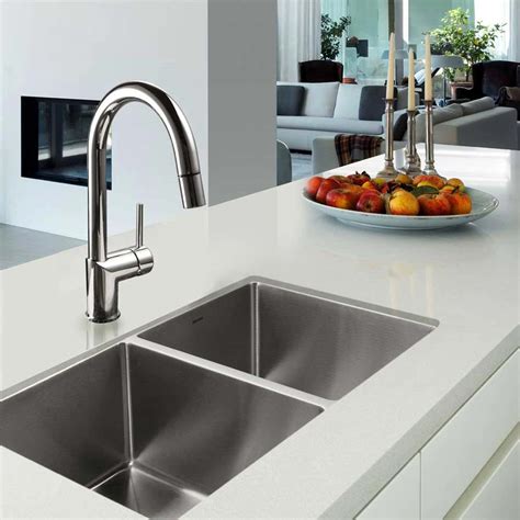 The edge lip of the sink is mounted below a solid surface countertop, so the sink effectively hangs underneath the thinking about renovating your kitchen? Nouvelle Series 15mm Radius Undermount Stainless Steel 50 ...