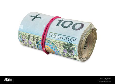 Polish Banknotes Of 100 Pln Rolled With Rubber Isolated On White