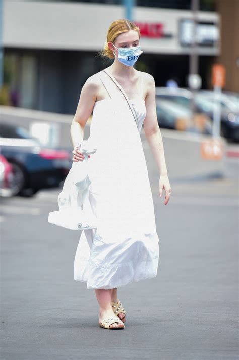 Elle Fanning In A White Maxi Dress Shopping In Los Angeles 1