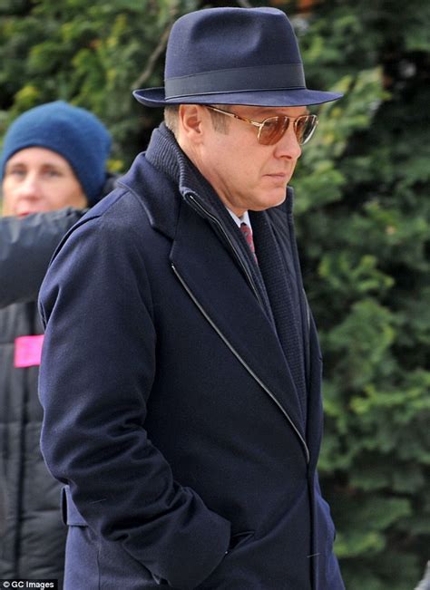 James Spader Looks Dapper In A Navy Fedora And Matching Wool Coat As He