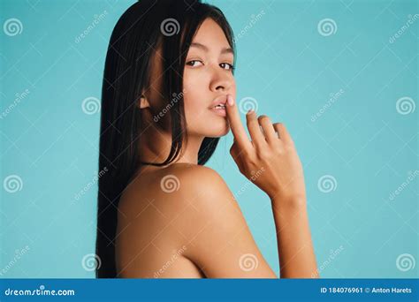 Attractive Asian Brunette Girl Confidently Looking In Camera Over
