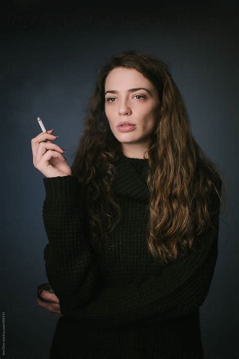 Woman Smoking Cigarette By Stocksy Contributor Ani Dimi Stocksy