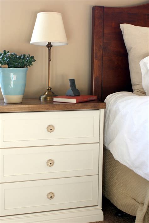 This time this is a stylish black and white striped piece that definitely spruces up a modern bedroom. {A CHARMING NEST}: {New Bedside Tables...theyre a RAST ...