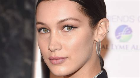 bella hadid is blonde and topless for paper magazine allure