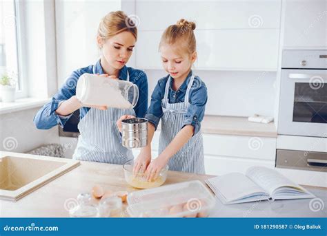 Mother With Daughter In The Kitchen Stock Image Image Of Daughter Home 181290587
