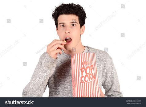Portrait Young Man Eating Popcorn Isolated Stock Photo 605990807