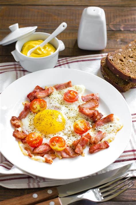 Fried Eggs With Bacon Stock Photo Image Of Lard Fried 33596372