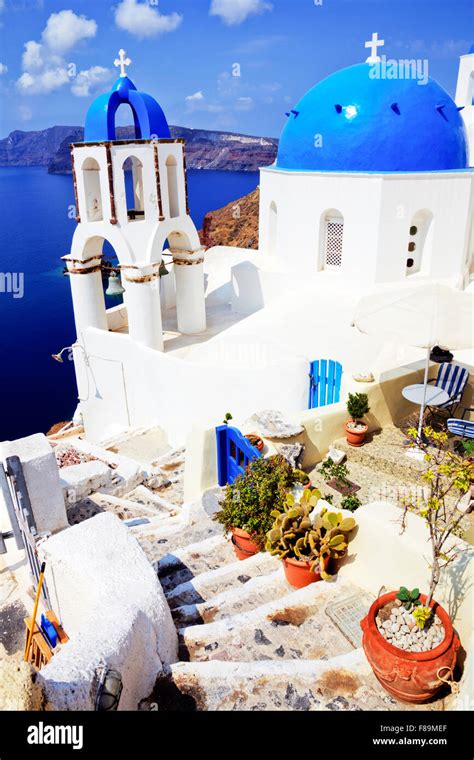 Oia Santorini And Beautiful White Washed Blue Domed Churches Are