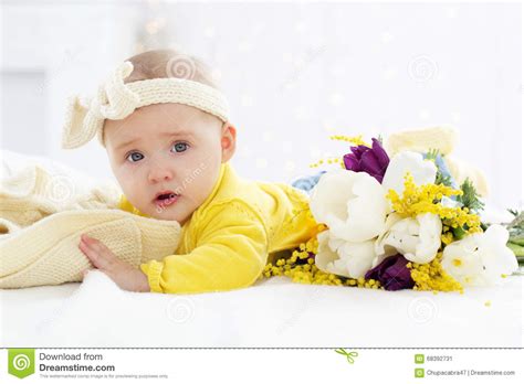 Baby Girl In Bed With Spring Flowers Stock Image Image