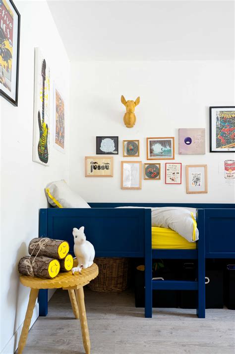 A removable wooden ladder is the most used way to access the beds because it keeps the compact design. 10 Excellently Eclectic Kids Rooms - Tinyme Blog