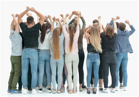 Group Of Diverse Young People Standing With Hands Up Stock Photo