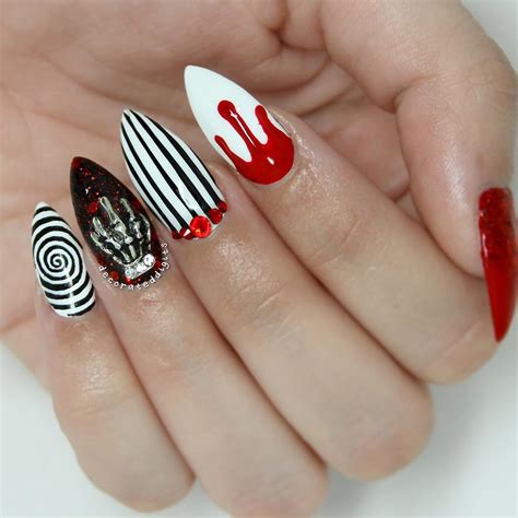 Bloody manicure is another trend in halloween nail design that looks pretty scary and frightening. 20+ Cool Halloween Nail Designs | Design Trends - Premium ...