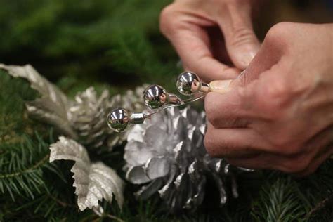 Tina blade looks great as she squirts 5 min. Holiday Wreath Making at Olander Park - The Blade