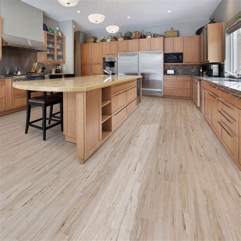 Instead of traditional square flooring, it comes in width: TrafficMASTER Allure Plus 5 in. x 36 in. Vintage Maple ...