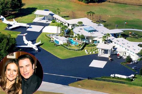 A boeing 707, owned by actor john travolta, sits parked in front of his home at the jumbolair. John Travolta-15 Amazing Celebrity Houses That Are Worth ...