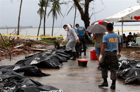 philippines typhoon haiyan bodies piled in streets as makeshift mortuaries are overrun daily