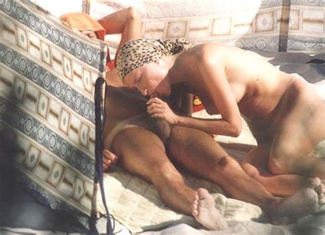 Amateur Couple At Beach Voyeur Oral Sex Nude Beach Pictures