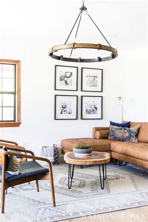On the other hand, a wood base's natural appeal adds a bit of rustic charm to a leather living room set. chandelier rustic leather - Google Търсене | Leather living room furniture, Farmhouse living ...